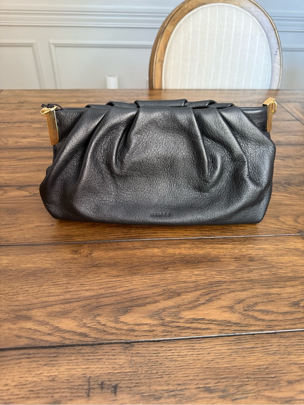 Aime Leon Dore Black Leather Pleated Clutch with Gold Accents